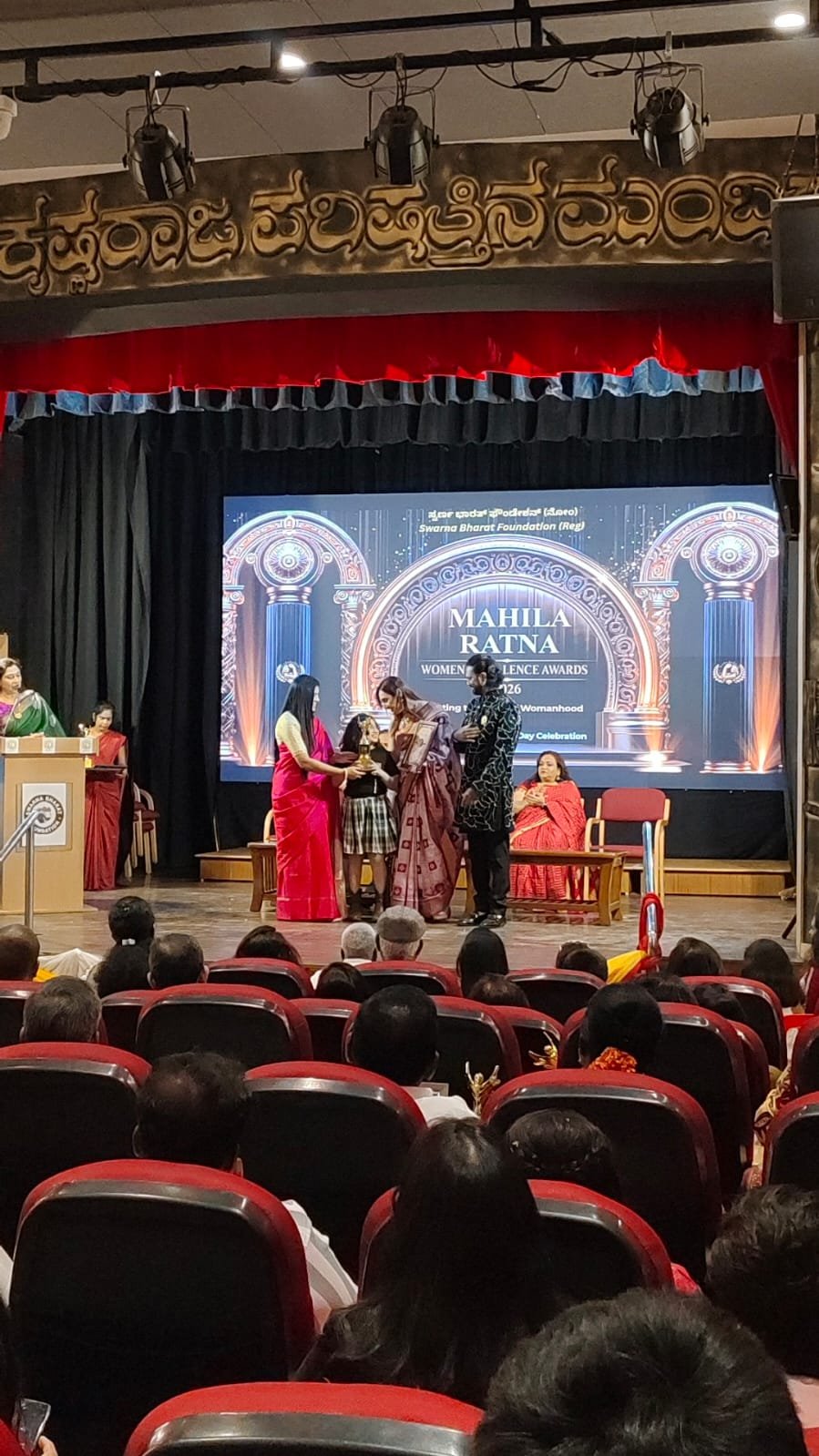 Receiving the Mahila Ratna trophy at the Women Excellence Awards 2026